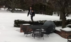 Puppy Loves Playing with Yoga Ball in the Snow