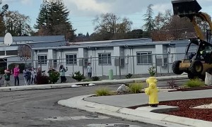 Construction Worker Shows Off for School Kids