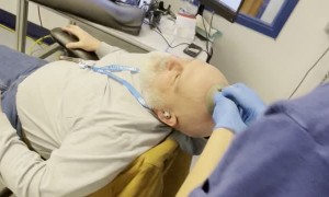 Putting a Super Strong Suction Cup on my Coworker's Head