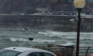 Rescuers Work to Recover Woman in Raging Waters