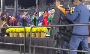 Paralyzed student heroically walks across stage for graduation 