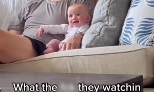 Adorable dad & daughter duo intensely watch TV