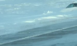 Car Stuck in Deep Snow after Blizzard