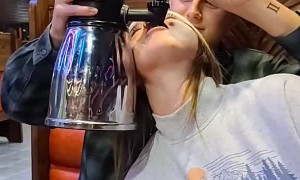 Girl Attempting to Chug Drink Tower Forgets to Swallow