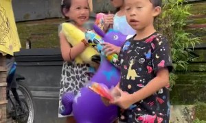 Balinese Santa Gives Gifts Away to Children