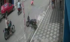 Handcuffed Inmate Escapes from Moving Police Car