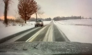 Passing on Icy Road Results in Rollover