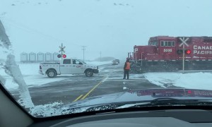 Train Pulls Stuck Truck From Snowbank