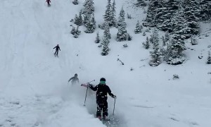 Skiers Skim Across Frozen Pond