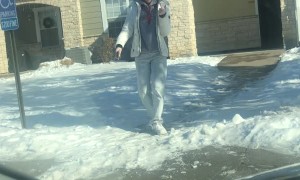 Confident Teen Slips on Ice