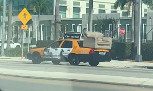 Taxicab Hauls Couch