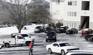 Good Samaritan Slides Across Icy Carpark