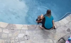 Mom saves kid after jumping in the pool