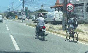 Bicyclist Being Towed by Motorcyclist Takes a Tumble