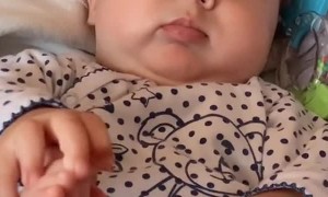 Baby Gets Startled by Sudden Noise