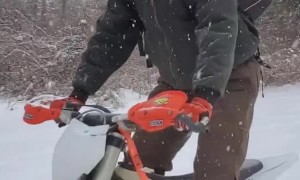 Pulling Out Dirt Bike in Winter Excites Dogs