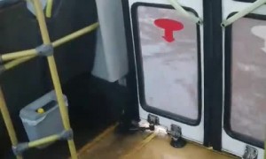 Water pours into bus during extreme flood in Porto Alegre, Brazil