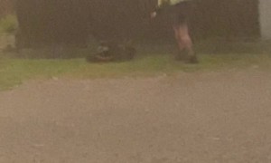 Massive Storm Doesn’t Stop Man From Mowing