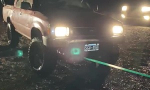 Water Logged Jeep Towed From Lake