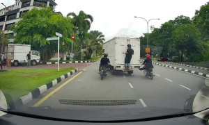 Lorry Pushed by Motorbikes