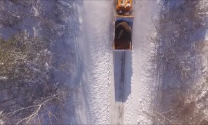 Snowplow Clears Deep Heavy Snow After Storm