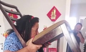 Husband Helps Wife Remove Stuck Chair