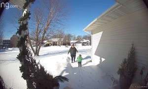 Kid Cracks up When Mom Slips on Ice