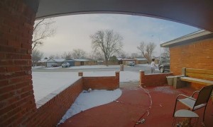 Guy Running out to Car Slips on Ice