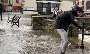 Guy Jumping Across Gap Gets Soaked by Tide