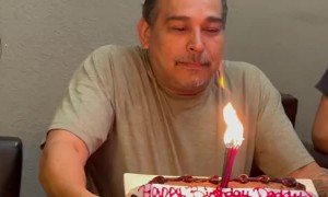 Dad Blowing Out Birthday Candles Loses Teeth