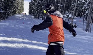 Snowboarder Trying to 50/50 Taco's Around Rail