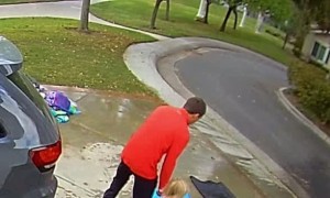 Daughter Gets Dad With Water Hose