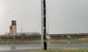 Round Rock Tornado Forming in the Distance From Car Dealership