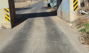 Truck Demolished After Passing Under Train Bridge