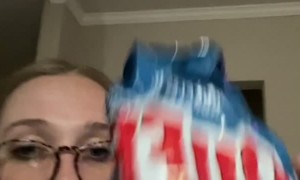 Cat Snatches Owner's Bag of Chips