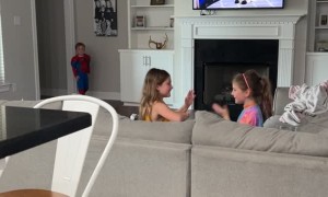 Girl's Hand Clapping Game Distracts from Spider-Man