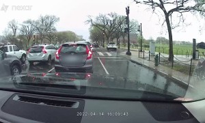 Man Jumps Out of His Car to Give a Stranger His Umbrella