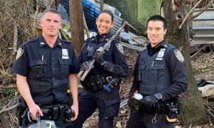 Police officers help rescue over a dozen chickens