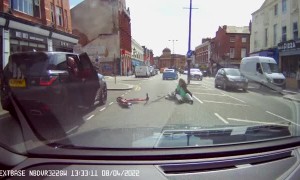 Woman Riding Scooter Gets Doored by Guy in Parked Car
