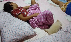 Puppy Pesters Sleeping Girl