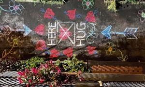 "Hug Here" Chalk Art Creates Heartwarming Moments