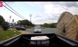 Truck Looses Spool and It Rolls Into Traffic