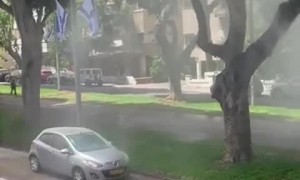 Malfunctioning Sprinkler Turns into Car Wash