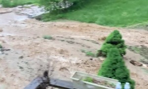Sudden Flood Forces Family to Flee Home