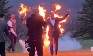 Bride & groom stunt doubles set themselves on fire for wedding exit