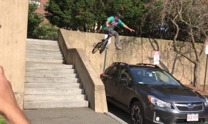 Biker Fails His Trick and Damages Car