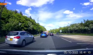 Taxi Swerves Through Traffic