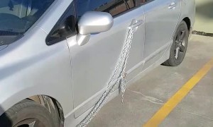 Car Secured With Lock and Chain