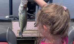 Kiddo Shows Off Her Catch