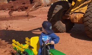 Boy Gets Toy Tractor Loaded by Real Excavator